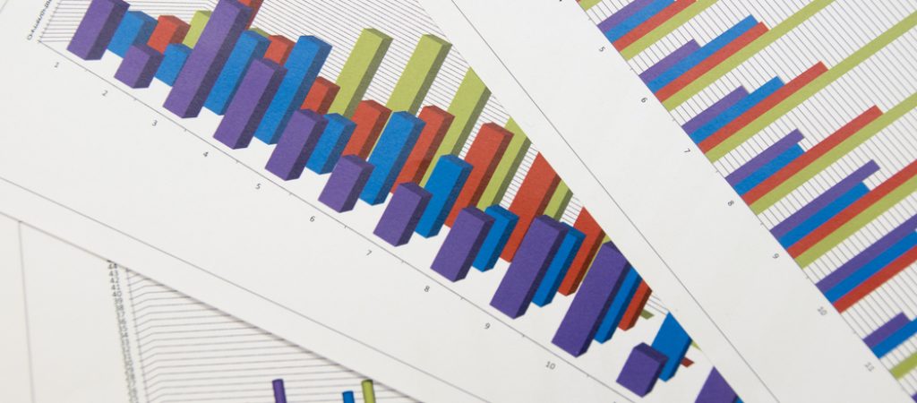 Financial,Paper,Charts,And,Graphs,On,The,Table