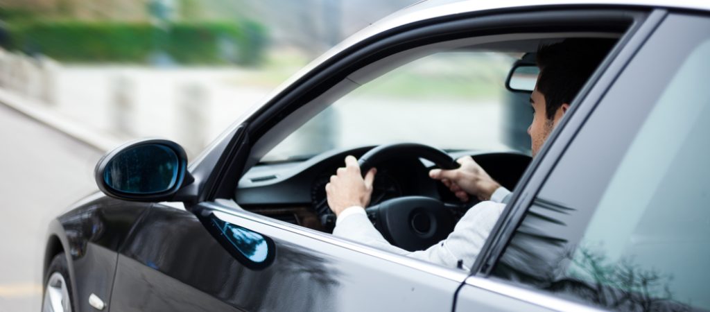 Portrait,Of,A,Man,Driving,A,Car