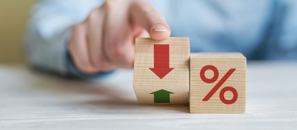 Interest,Rate,Financial,And,Mortgage,Rates,Concept.,Hand,Flip,Wood